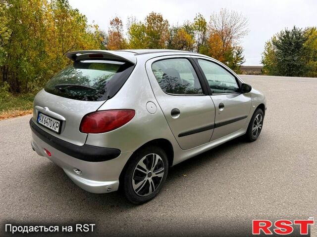 Серый Пежо 206, объемом двигателя 1.4 л и пробегом 175 тыс. км за 2850 $, фото 5 на Automoto.ua
