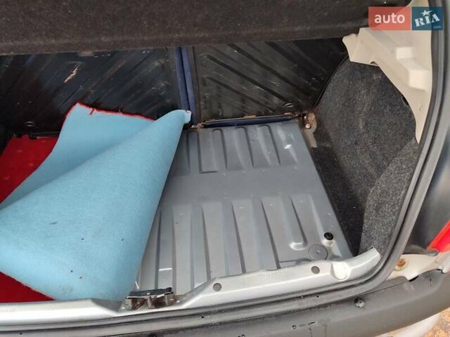 Серый Пежо 206, объемом двигателя 1.12 л и пробегом 154 тыс. км за 2900 $, фото 19 на Automoto.ua