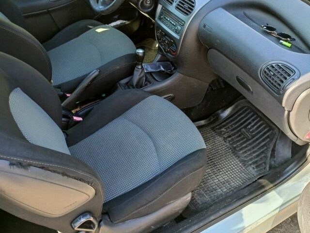 Сірий Пежо 206, об'ємом двигуна 1.4 л та пробігом 200 тис. км за 2399 $, фото 12 на Automoto.ua