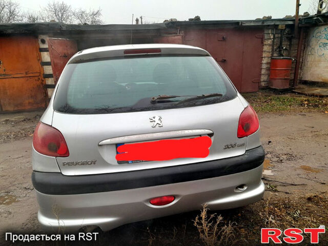 Сірий Пежо 206, об'ємом двигуна 1.9 л та пробігом 308 тис. км за 2500 $, фото 3 на Automoto.ua