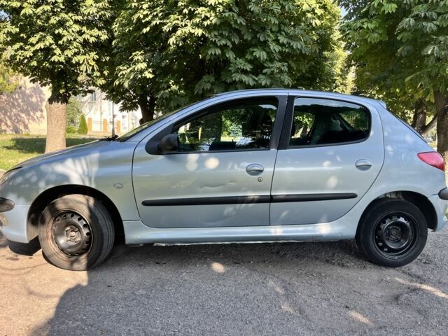 Серый Пежо 206, объемом двигателя 1.4 л и пробегом 343 тыс. км за 2800 $, фото 6 на Automoto.ua