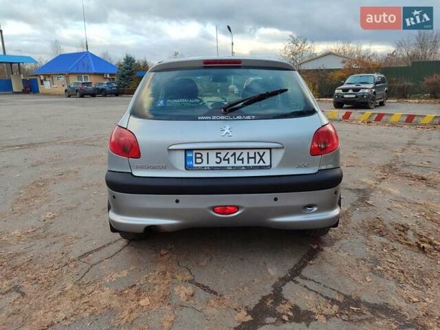 Серый Пежо 206, объемом двигателя 1.12 л и пробегом 154 тыс. км за 2900 $, фото 4 на Automoto.ua