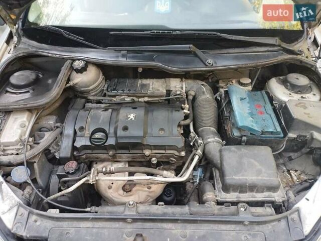Серый Пежо 206, объемом двигателя 1.6 л и пробегом 310 тыс. км за 2550 $, фото 3 на Automoto.ua