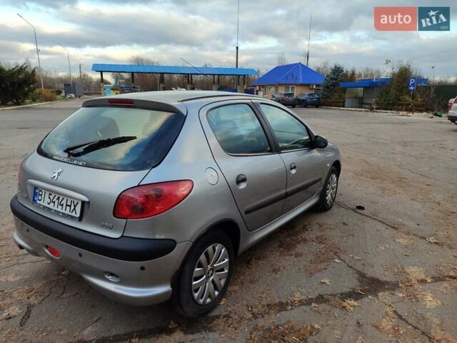 Серый Пежо 206, объемом двигателя 1.12 л и пробегом 154 тыс. км за 2900 $, фото 2 на Automoto.ua