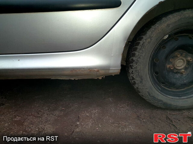 Сірий Пежо 206, об'ємом двигуна 1.9 л та пробігом 308 тис. км за 2500 $, фото 4 на Automoto.ua