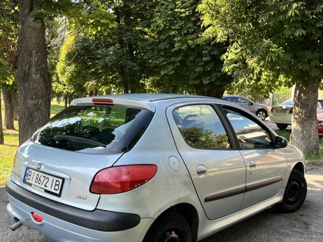 Серый Пежо 206, объемом двигателя 1.4 л и пробегом 343 тыс. км за 2500 $, фото 6 на Automoto.ua