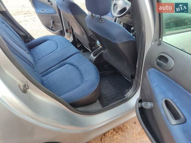 Серый Пежо 206, объемом двигателя 1.12 л и пробегом 154 тыс. км за 2900 $, фото 15 на Automoto.ua