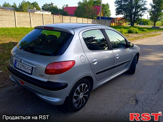 Серый Пежо 206, объемом двигателя 1.1 л и пробегом 256 тыс. км за 3150 $, фото 4 на Automoto.ua