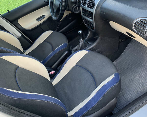 Серый Пежо 206, объемом двигателя 1.36 л и пробегом 115 тыс. км за 2500 $, фото 23 на Automoto.ua