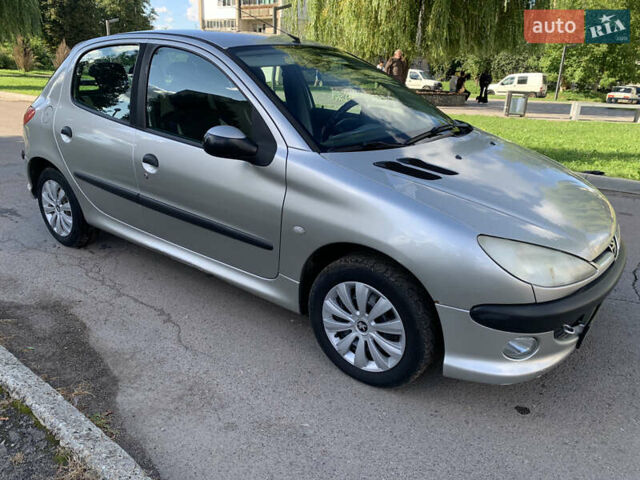 Серый Пежо 206, объемом двигателя 1.36 л и пробегом 115 тыс. км за 2500 $, фото 12 на Automoto.ua