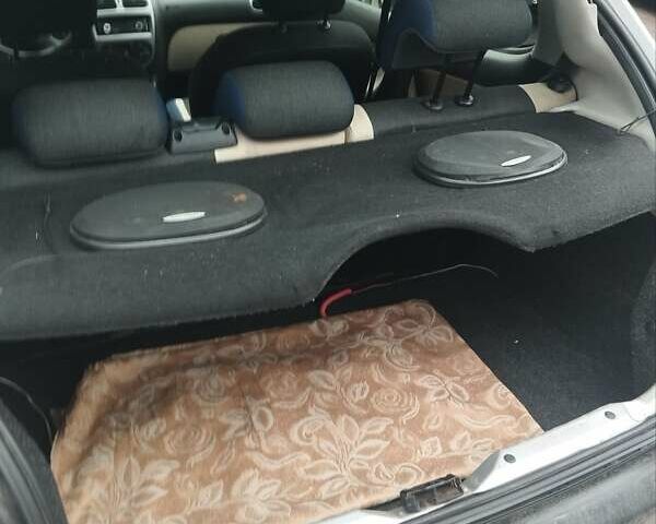 Серый Пежо 206, объемом двигателя 1.1 л и пробегом 180 тыс. км за 2700 $, фото 1 на Automoto.ua