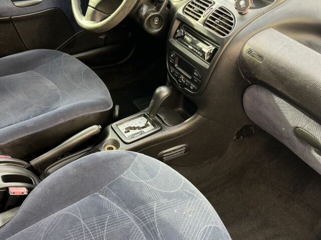 Серый Пежо 206, объемом двигателя 1.4 л и пробегом 130 тыс. км за 3000 $, фото 6 на Automoto.ua