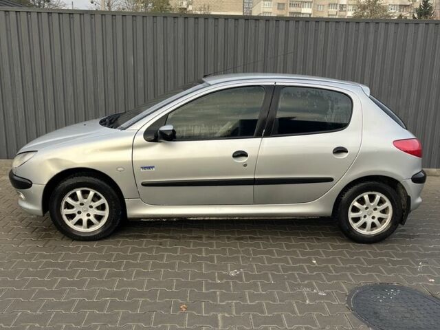 Серый Пежо 206, объемом двигателя 1.4 л и пробегом 130 тыс. км за 3000 $, фото 3 на Automoto.ua