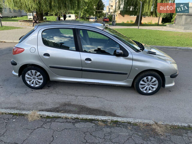 Серый Пежо 206, объемом двигателя 1.36 л и пробегом 115 тыс. км за 2500 $, фото 11 на Automoto.ua
