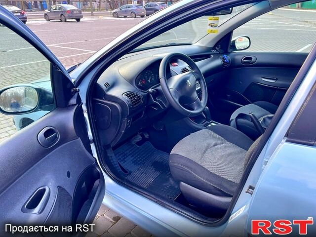 Серый Пежо 206, объемом двигателя 1.4 л и пробегом 180 тыс. км за 4199 $, фото 12 на Automoto.ua