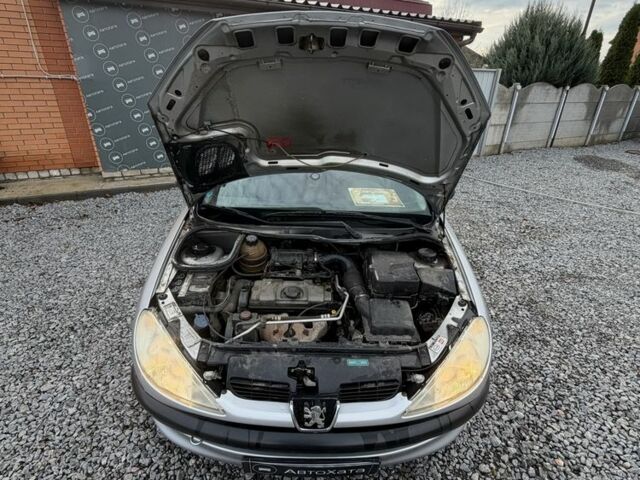 Серый Пежо 206, объемом двигателя 1.4 л и пробегом 260 тыс. км за 3500 $, фото 7 на Automoto.ua