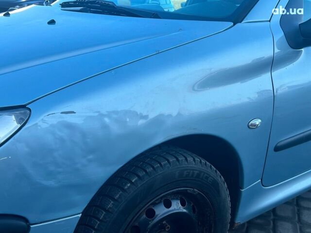 Сірий Пежо 206, об'ємом двигуна 1.2 л та пробігом 211 тис. км за 1300 $, фото 4 на Automoto.ua