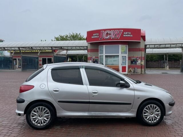 Серый Пежо 206, объемом двигателя 1.4 л и пробегом 290 тыс. км за 2550 $, фото 11 на Automoto.ua