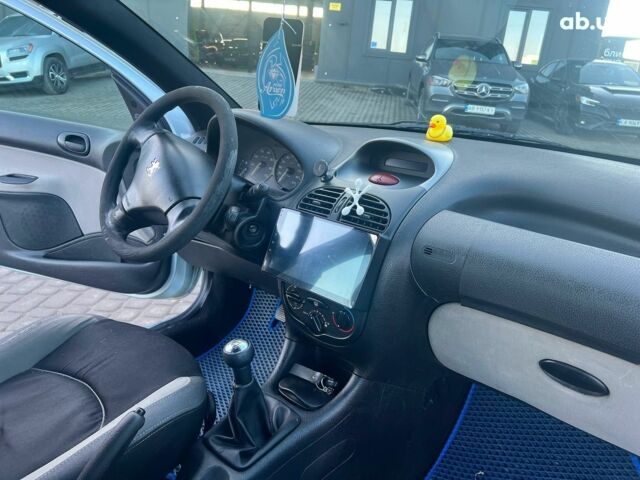 Сірий Пежо 206, об'ємом двигуна 1.2 л та пробігом 211 тис. км за 1300 $, фото 30 на Automoto.ua