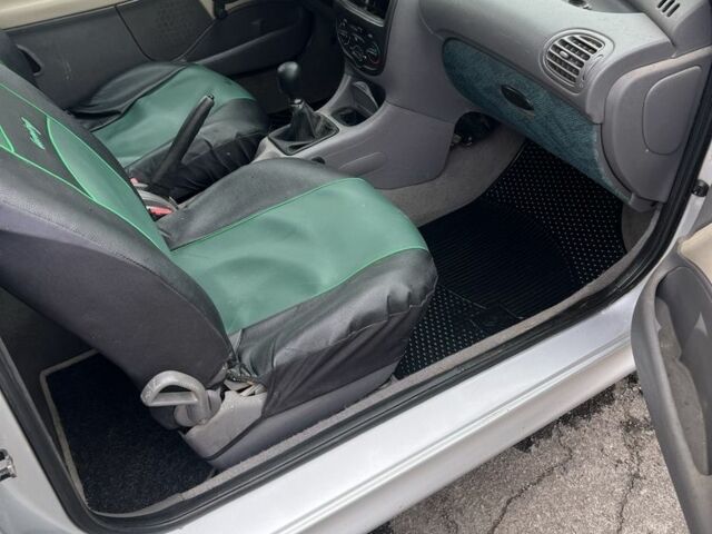 Серый Пежо 206, объемом двигателя 1.4 л и пробегом 230 тыс. км за 650 $, фото 7 на Automoto.ua