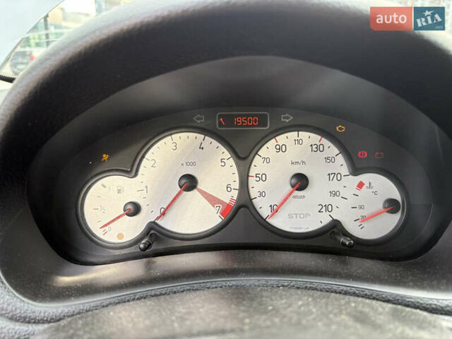 Сірий Пежо 206, об'ємом двигуна 1.4 л та пробігом 160 тис. км за 4000 $, фото 12 на Automoto.ua