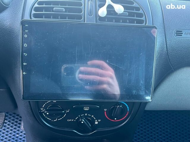 Сірий Пежо 206, об'ємом двигуна 1.2 л та пробігом 211 тис. км за 1300 $, фото 17 на Automoto.ua