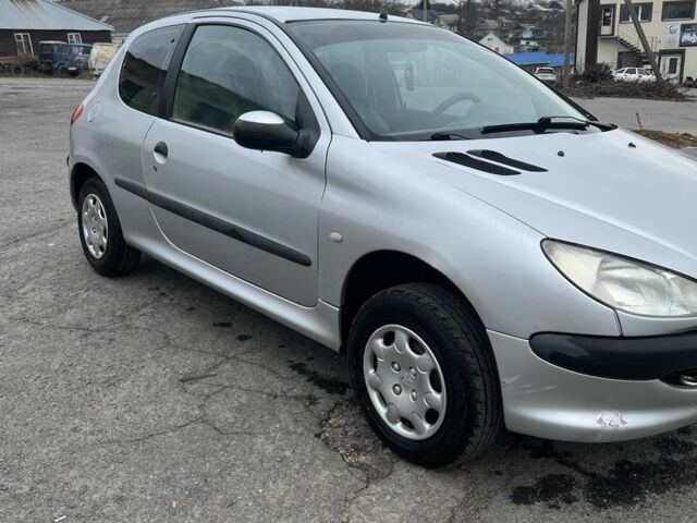 Серый Пежо 206, объемом двигателя 1.4 л и пробегом 230 тыс. км за 650 $, фото 5 на Automoto.ua