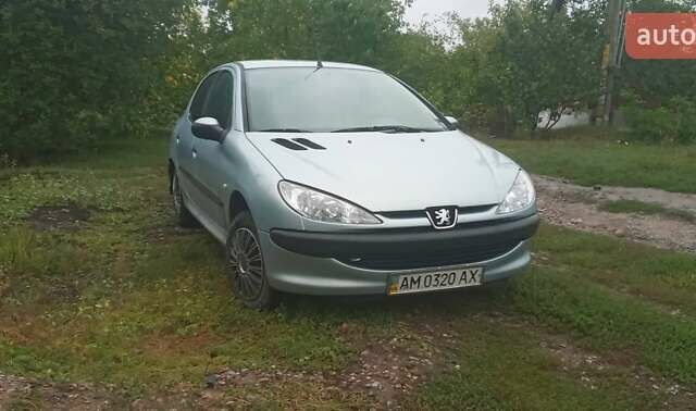 Серый Пежо 206, объемом двигателя 1.4 л и пробегом 220 тыс. км за 3400 $, фото 10 на Automoto.ua