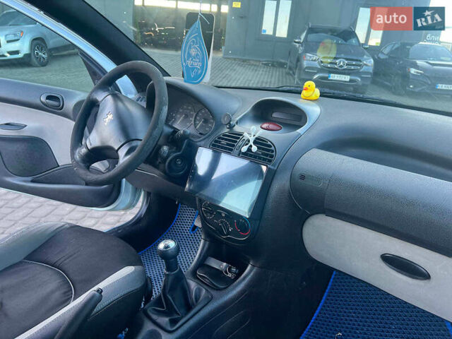 Сірий Пежо 206, об'ємом двигуна 1.2 л та пробігом 211 тис. км за 1300 $, фото 30 на Automoto.ua