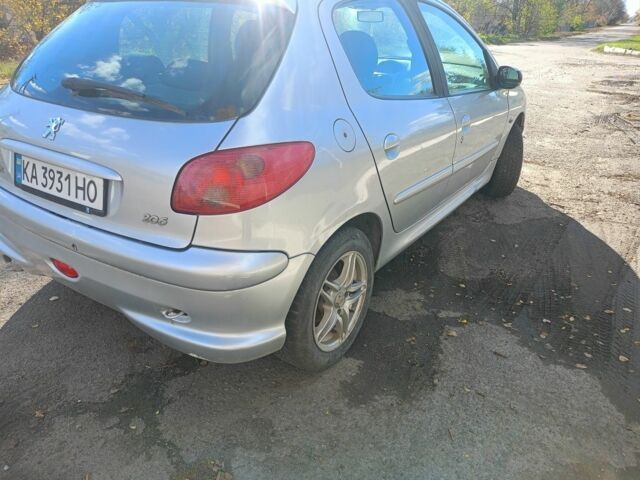 Серый Пежо 206, объемом двигателя 1.4 л и пробегом 170 тыс. км за 3800 $, фото 7 на Automoto.ua