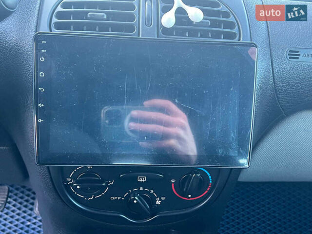 Сірий Пежо 206, об'ємом двигуна 1.2 л та пробігом 211 тис. км за 1300 $, фото 17 на Automoto.ua