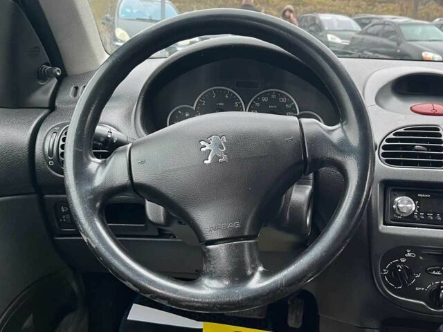 Серый Пежо 206, объемом двигателя 1.4 л и пробегом 171 тыс. км за 3999 $, фото 10 на Automoto.ua