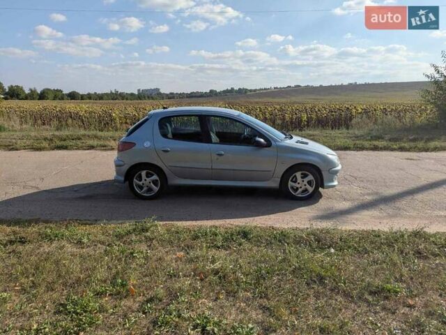 Сірий Пежо 206, об'ємом двигуна 1.59 л та пробігом 246 тис. км за 4100 $, фото 4 на Automoto.ua