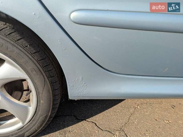 Сірий Пежо 206, об'ємом двигуна 1.59 л та пробігом 246 тис. км за 4100 $, фото 9 на Automoto.ua