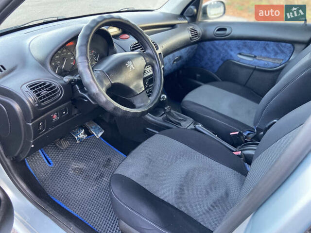 Серый Пежо 206, объемом двигателя 1.36 л и пробегом 173 тыс. км за 3350 $, фото 6 на Automoto.ua