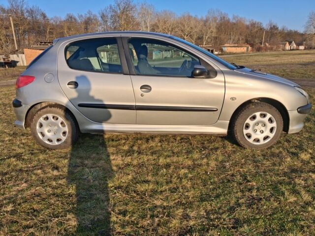Сірий Пежо 206, об'ємом двигуна 1.4 л та пробігом 340 тис. км за 3800 $, фото 2 на Automoto.ua
