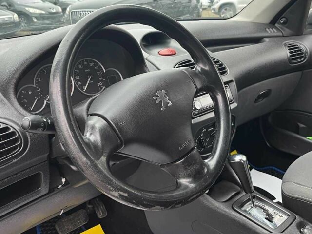 Серый Пежо 206, объемом двигателя 1.4 л и пробегом 171 тыс. км за 3999 $, фото 9 на Automoto.ua