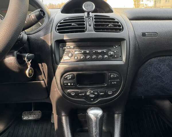 Серый Пежо 206, объемом двигателя 1.59 л и пробегом 90 тыс. км за 3399 $, фото 14 на Automoto.ua