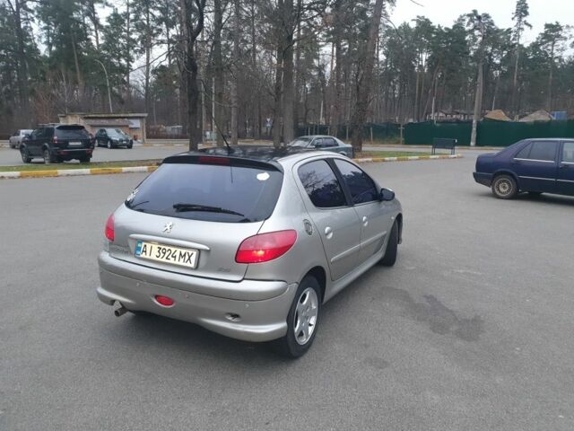 Серый Пежо 206, объемом двигателя 1.4 л и пробегом 260 тыс. км за 3000 $, фото 4 на Automoto.ua