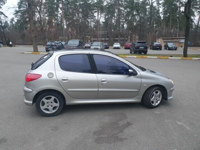 Серый Пежо 206, объемом двигателя 1.4 л и пробегом 260 тыс. км за 3000 $, фото 6 на Automoto.ua