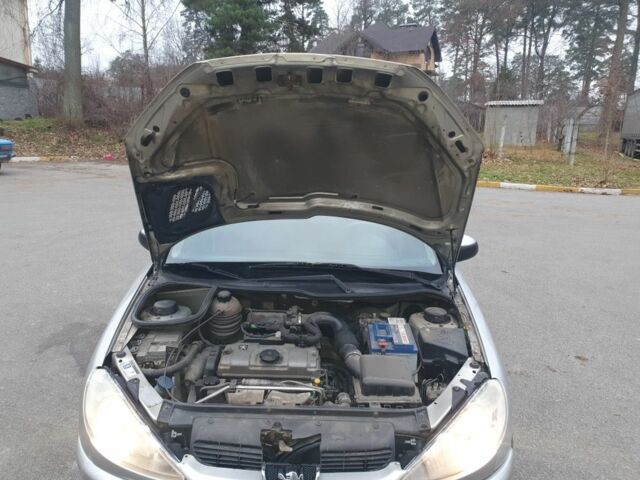 Серый Пежо 206, объемом двигателя 1.4 л и пробегом 260 тыс. км за 3000 $, фото 19 на Automoto.ua