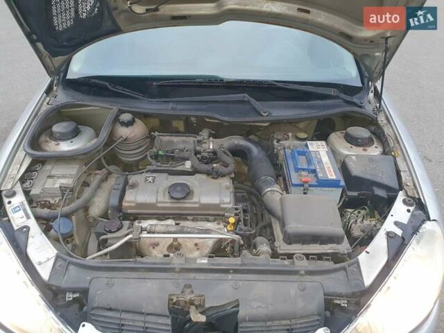 Сірий Пежо 206, об'ємом двигуна 1.36 л та пробігом 260 тис. км за 3000 $, фото 11 на Automoto.ua