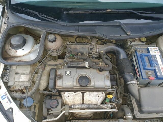 Серый Пежо 206, объемом двигателя 1.4 л и пробегом 260 тыс. км за 3000 $, фото 18 на Automoto.ua