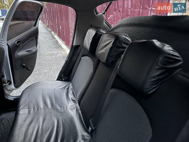 Серый Пежо 206, объемом двигателя 1.36 л и пробегом 278 тыс. км за 3250 $, фото 9 на Automoto.ua