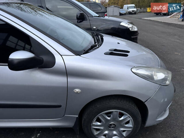 Серый Пежо 206, объемом двигателя 1.36 л и пробегом 278 тыс. км за 3250 $, фото 25 на Automoto.ua