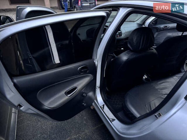 Серый Пежо 206, объемом двигателя 1.36 л и пробегом 278 тыс. км за 3250 $, фото 7 на Automoto.ua