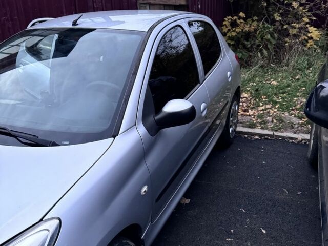 Серый Пежо 206, объемом двигателя 1.4 л и пробегом 278 тыс. км за 3250 $, фото 18 на Automoto.ua