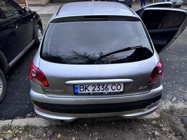 Серый Пежо 206, объемом двигателя 1.4 л и пробегом 278 тыс. км за 3250 $, фото 14 на Automoto.ua