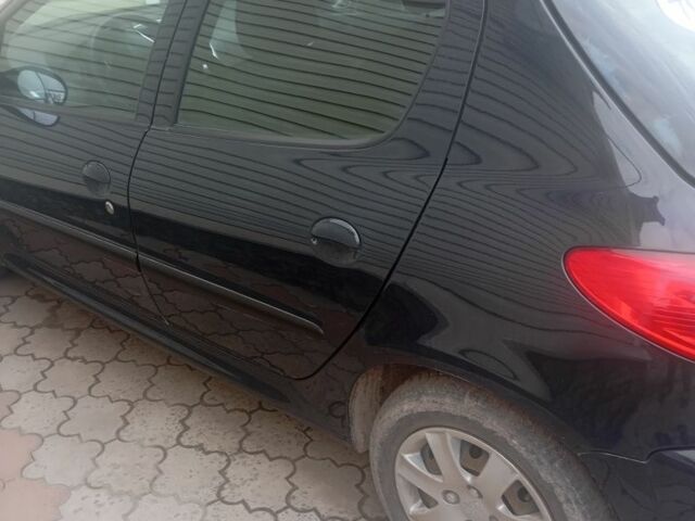 Серый Пежо 206, объемом двигателя 1.1 л и пробегом 124 тыс. км за 4300 $, фото 4 на Automoto.ua