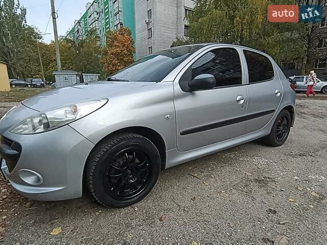 Сірий Пежо 206, об'ємом двигуна 1.4 л та пробігом 197 тис. км за 4699 $, фото 13 на Automoto.ua